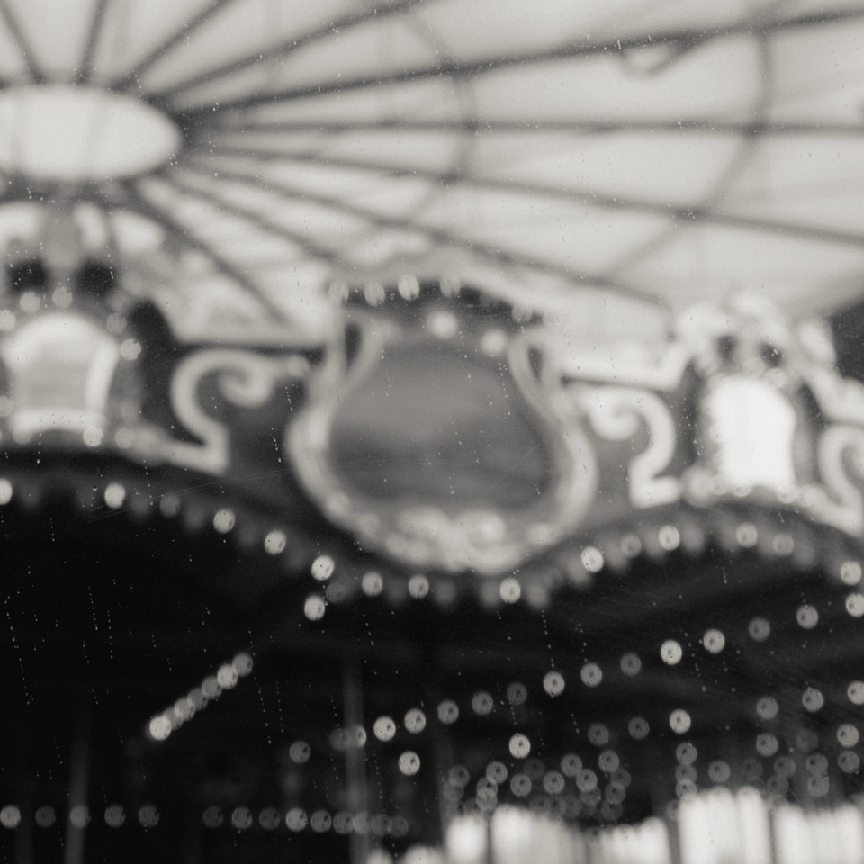 A carousel at night, black and white